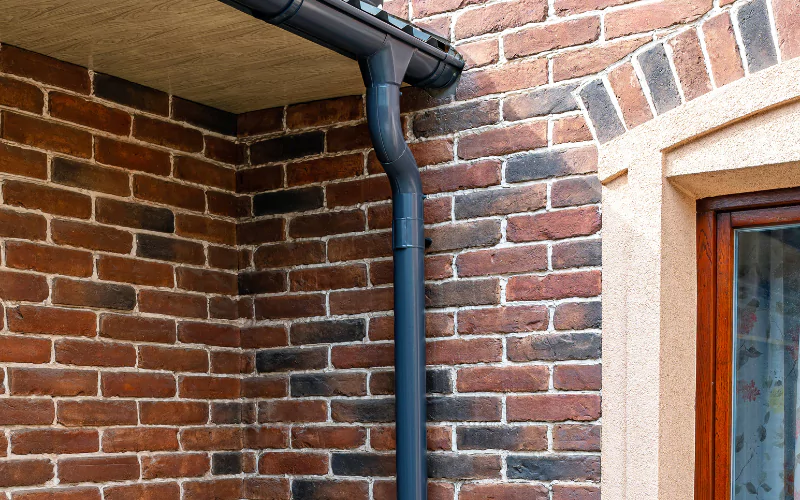 gutter system with downspouts